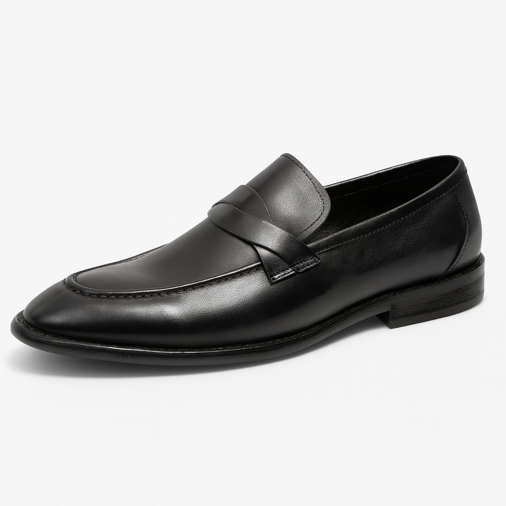 Classic leather loafer featuring a sleek silhouette, low heel, and polished finish.