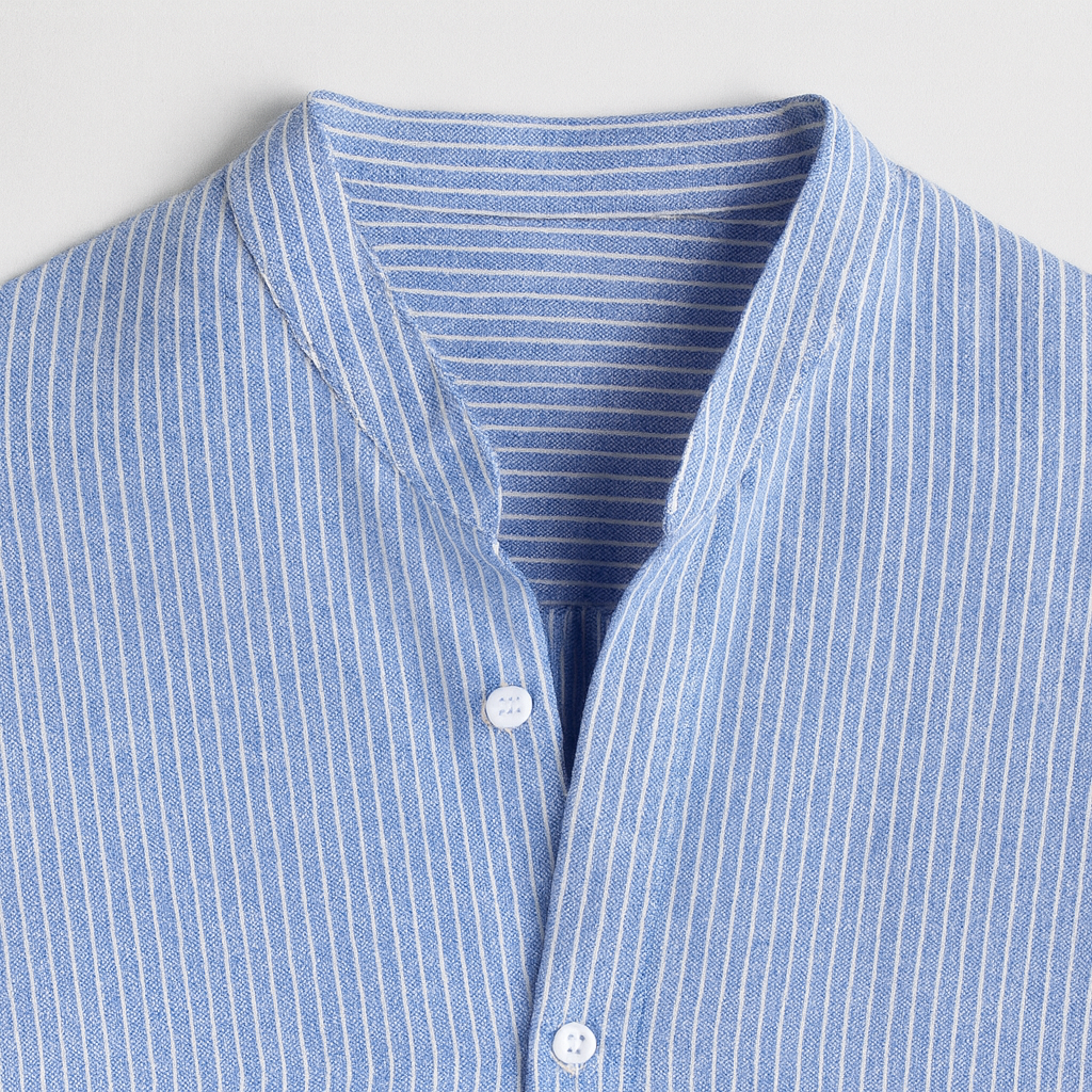 A long-sleeve shirt with a band collar and a partial button placket.