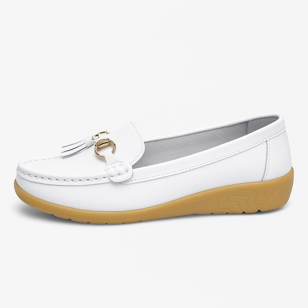 Classic loafers featuring tassel accents, gold hardware detail, and cushioned soles for comfort.