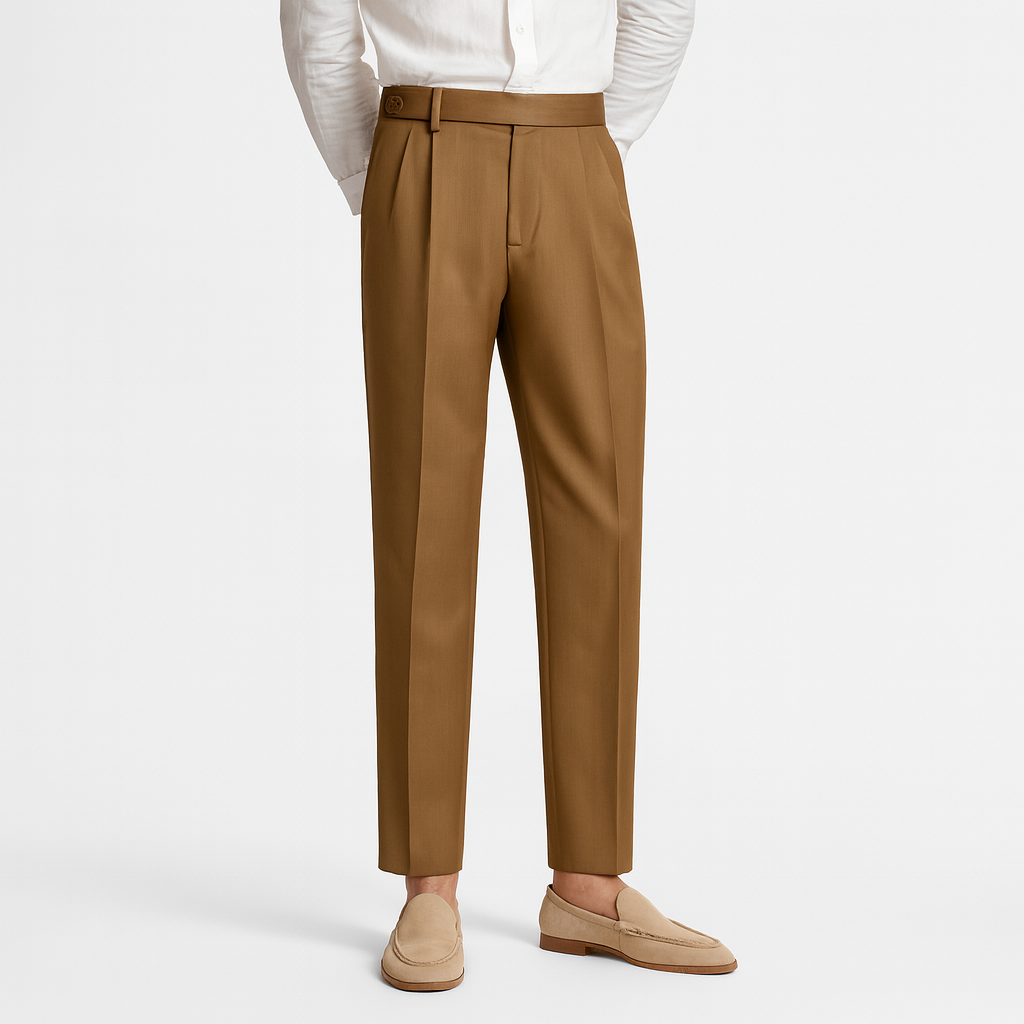Tailored trousers with front pleats, a high waist featuring a side buckle detail, and tapered legs.