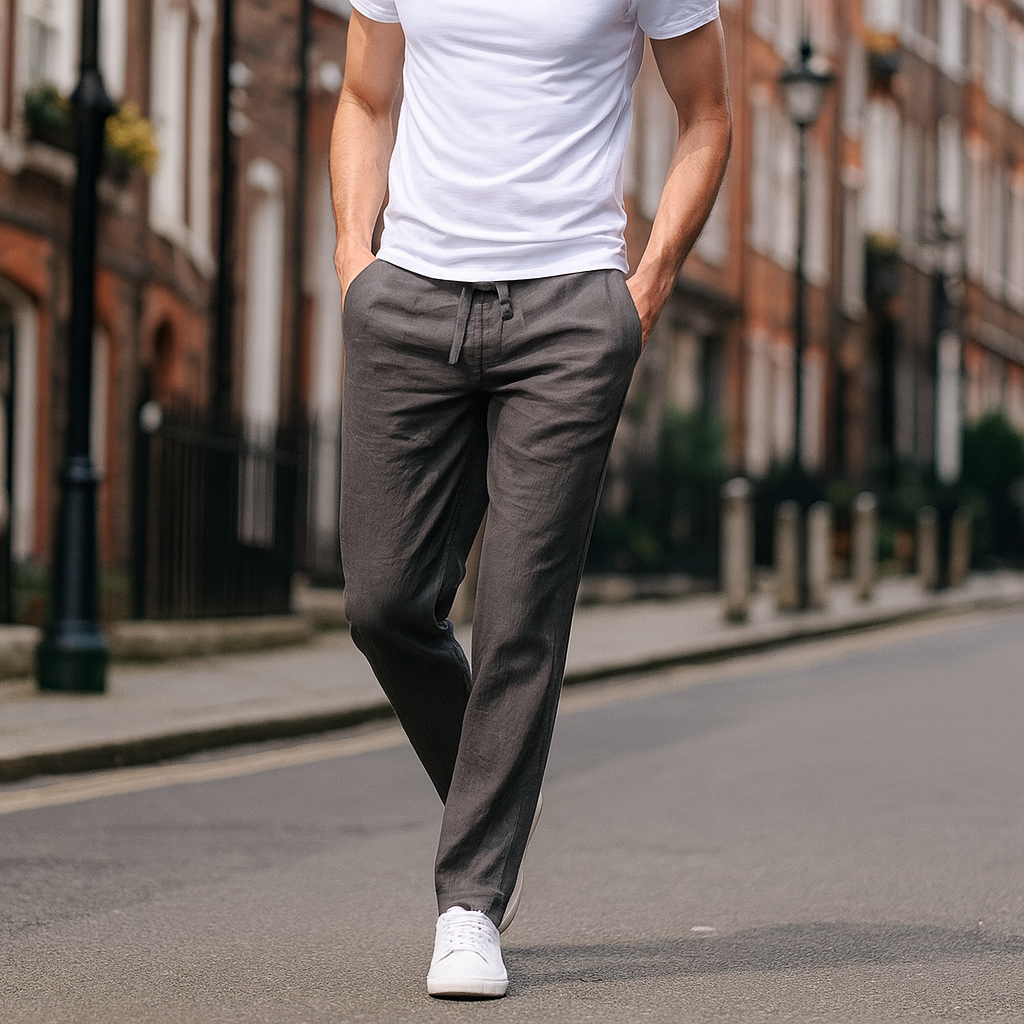 Relaxed-fit pants with an elastic waistband, drawstring tie, and straight legs.