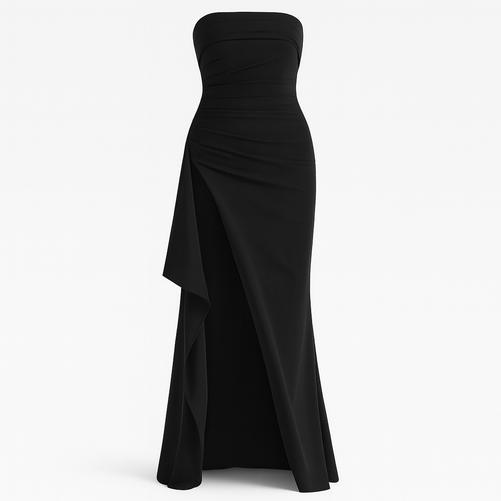 Strapless evening gown with ruched detailing and a high front slit, styled with heels and minimal jewelry.
