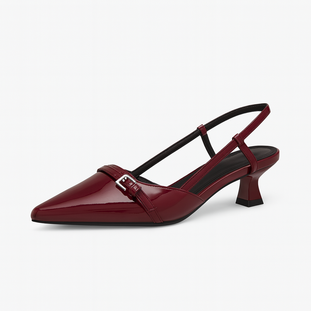 A pointed-toe slingback heel with a buckle detail and a low block heel.